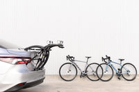 Saris Bones Trunk Rack — hook arm attachment point on trunk lid close-up