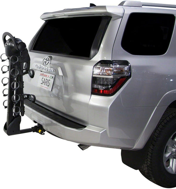 Saris Bones 2-Bike Trunk Rack on hatchback — rear-right angle, bikes secured
