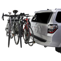 Saris SuperClamp G4 2-Bike Hitch Rack — loaded with bikes in driveway