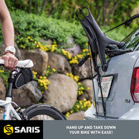 Saris Bones EX 3-Bike Trunk Rack — mounted on sedan, three bikes loaded