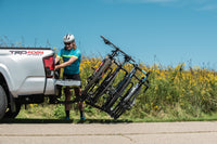 Saris Freedom 4-Bike Hitch Rack — mounted on vehicle with bikes loaded
