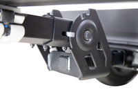 Saris MHS base unit tilted down — one-hand operation for rear access