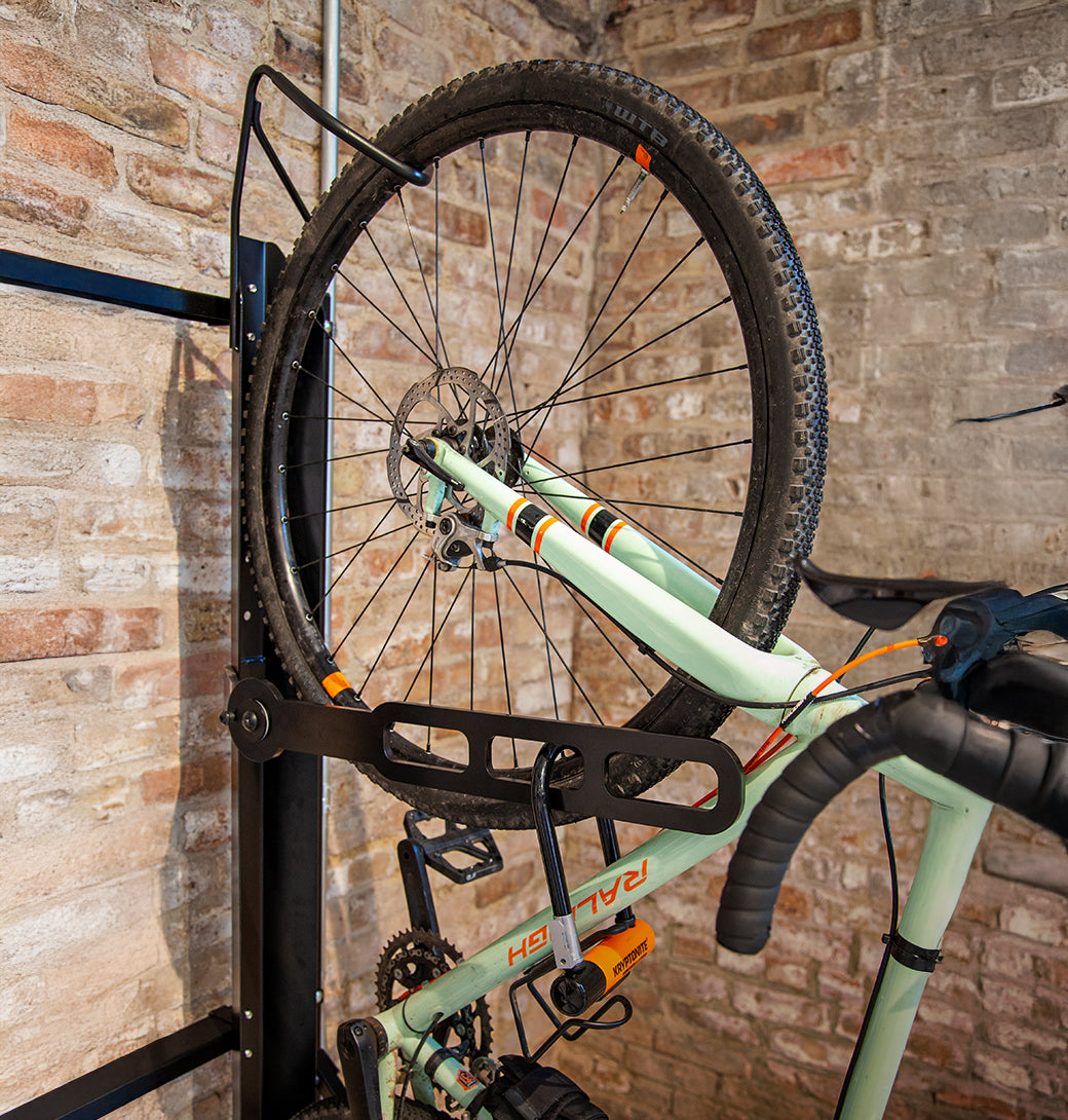 Saris Bones Trunk Rack — anti-sway cradle securing a road bike top tube