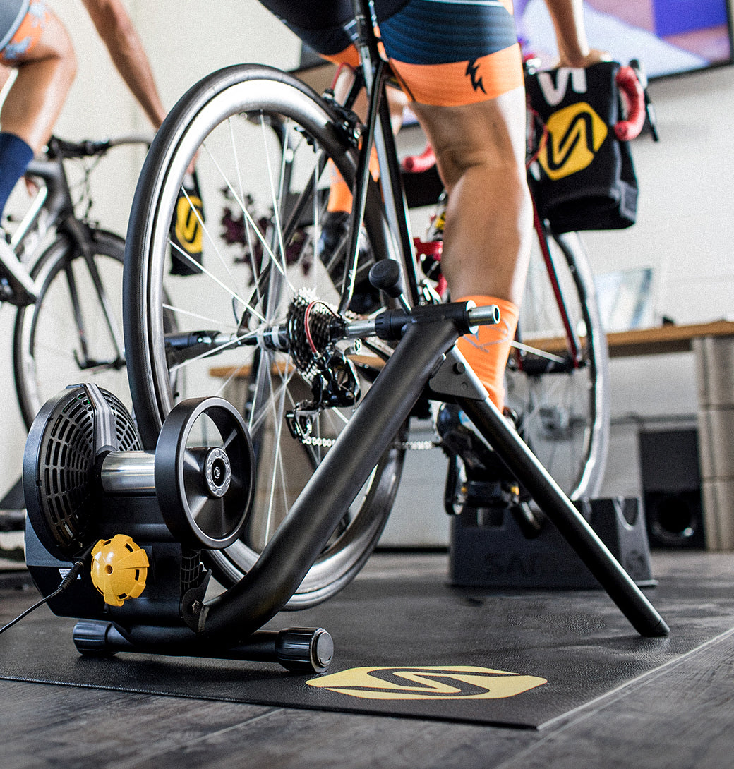 Athlete doing a threshold interval on the Saris M2 Smart Trainer at home