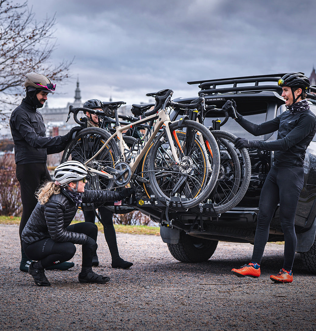 Four bikes loaded on the Saris SuperClamp G3 4-Bike Hitch Rack on an SUV