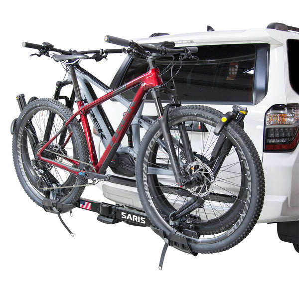 Saris SuperClamp G3 2-Bike Hitch Rack tilted down for cargo hatch access