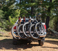 Five bikes fully loaded on the Saris Tailgate Pad — maximum capacity view