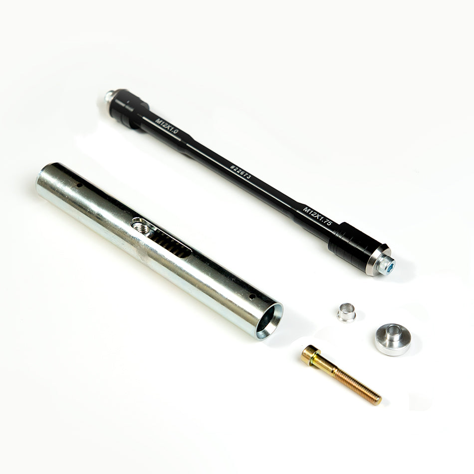 Saris UDH MTB Thru-Axle Trainer Adapter — showing adapter and axle thread