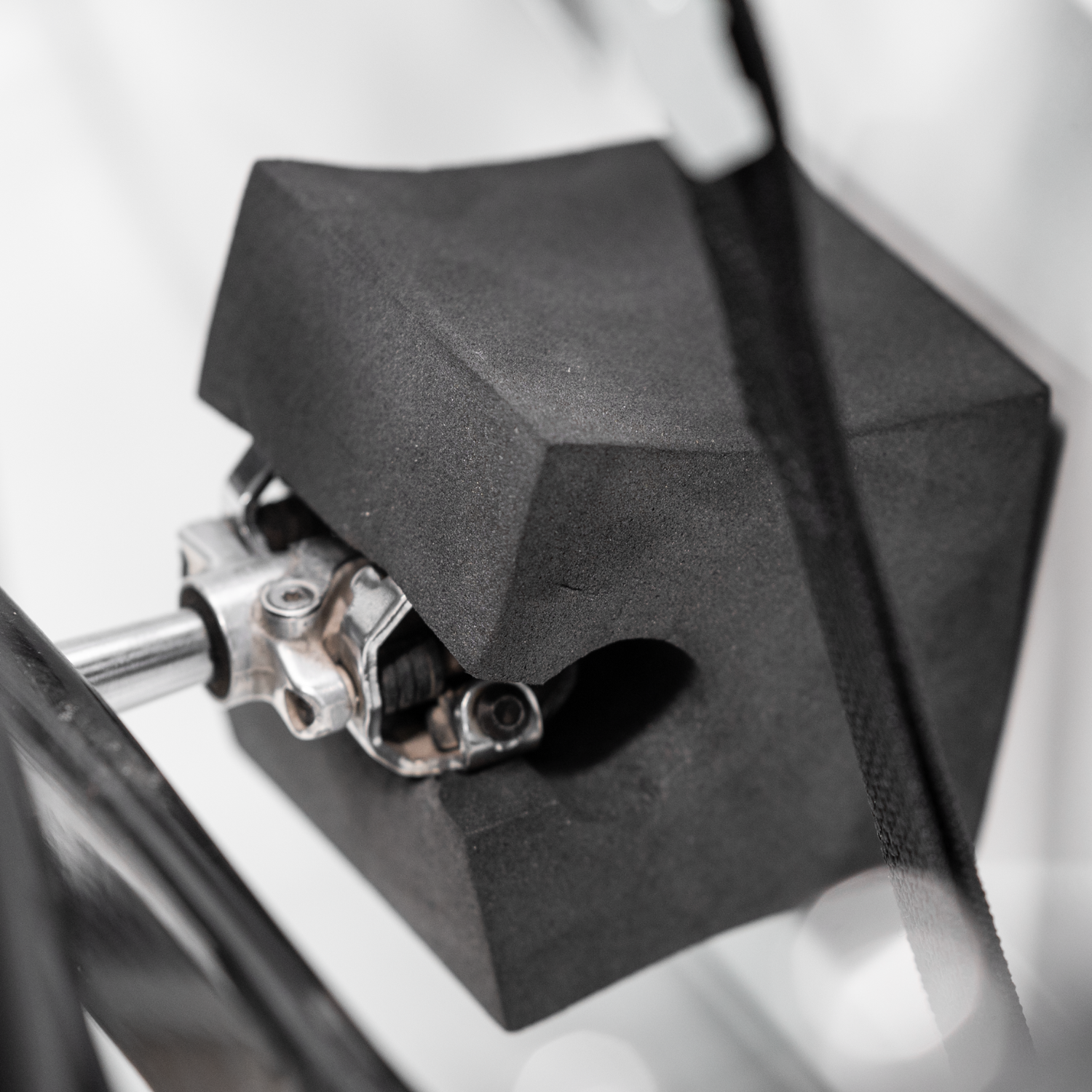 Saris Protect-O-Pads — padding wrapped around rack arm, frame contact point covered