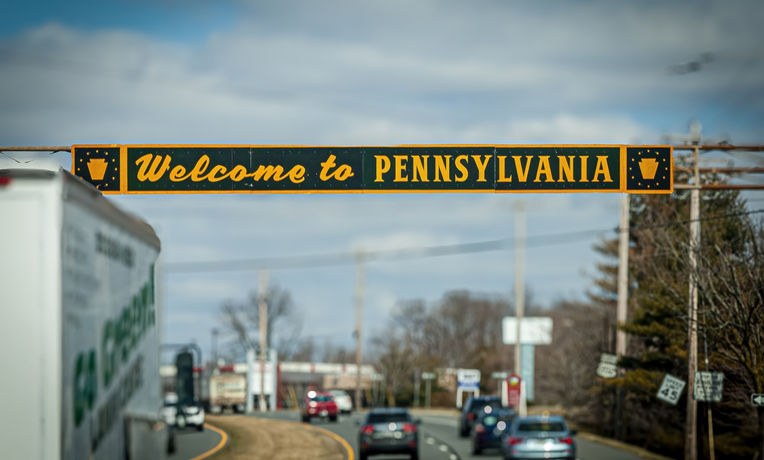 Welcome to Pennsylvania road sign over highway